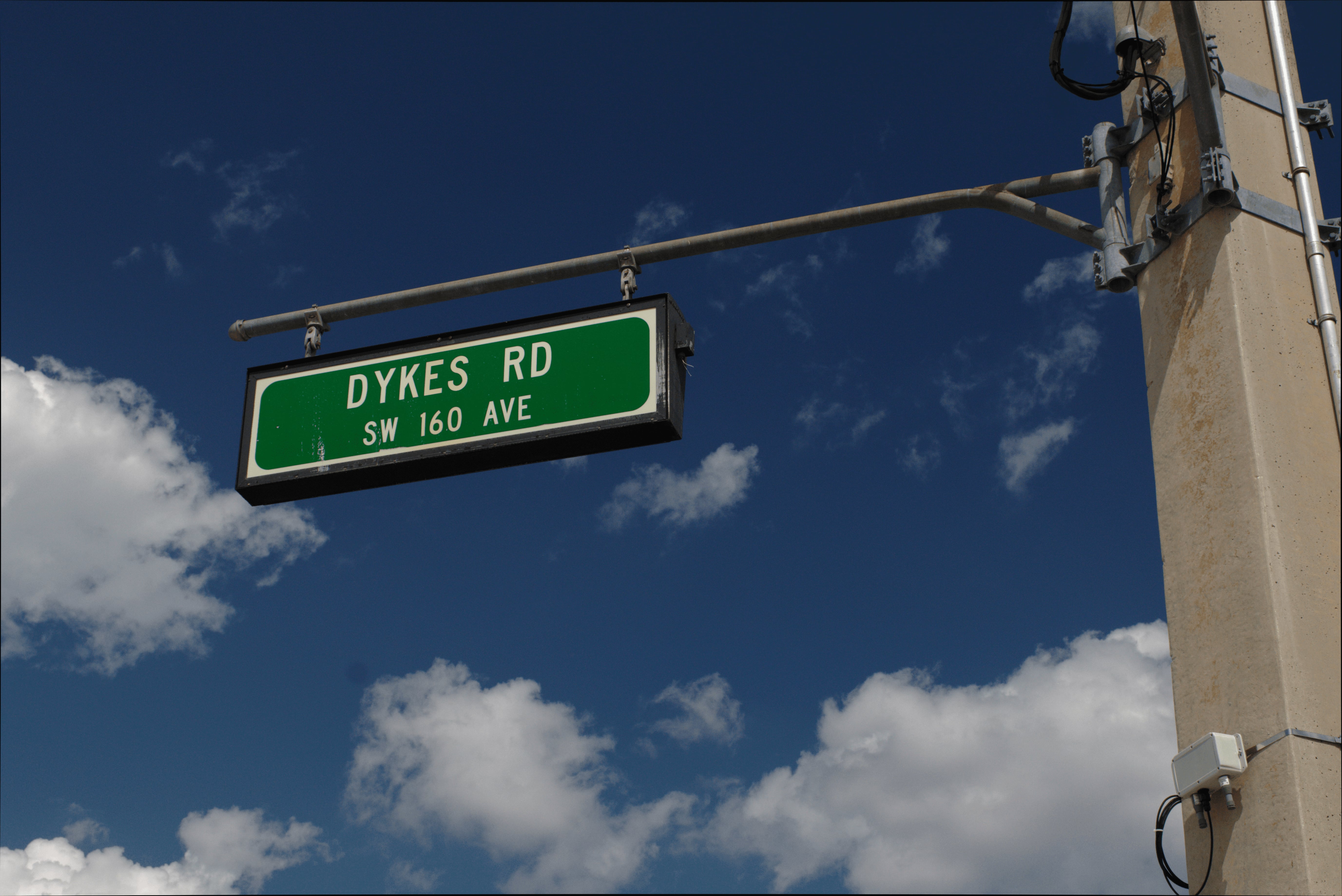 Dykes Rd Street Sign